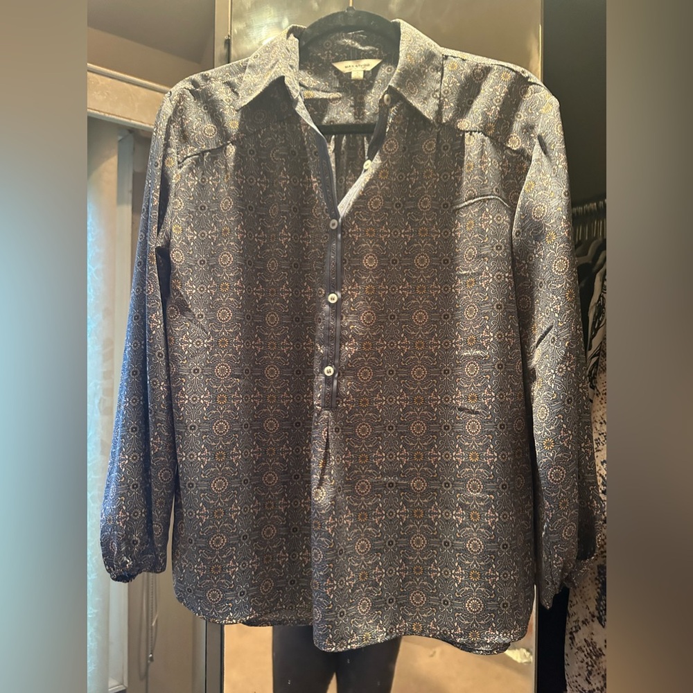 It’s a beautiful shirt. I wore it 1 time. And then I had it dry cleaned.